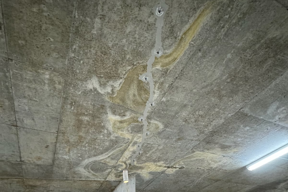 Stabilized overhead slab with complete epoxy penetration